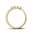 0.35 carat trilogy ring in yellow gold with round diamonds