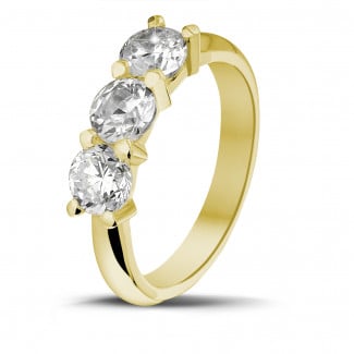 2.05 carat trilogy ring in yellow gold with round diamonds