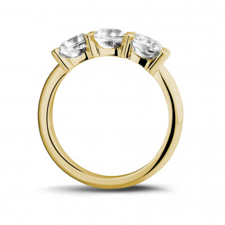 2.05 carat trilogy ring in yellow gold with round diamonds