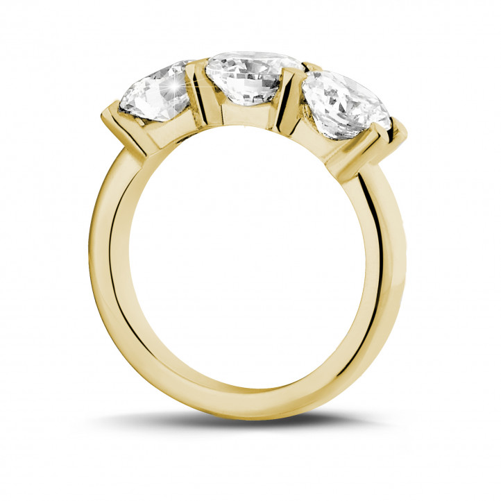 3.00 carat trilogy ring in yellow gold with round diamonds