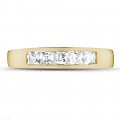 0.75 carat yellow golden eternity ring with princess diamonds