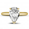 3.00 carat solitaire ring in yellow gold with pear shaped diamond
