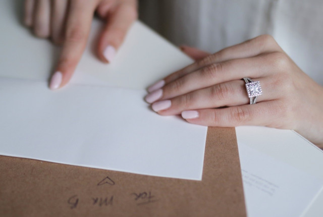 Beautiful engagement ring with a princess cut diamond Choosing the right diamonds guarantees an affordable engagement ring