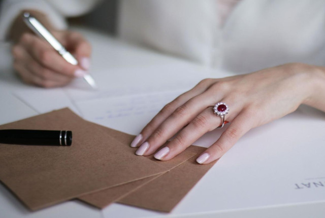 Woman with ring with red ruby - BAUNAT