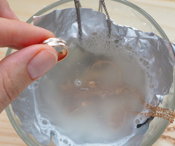 Cleaning golden rings in water 