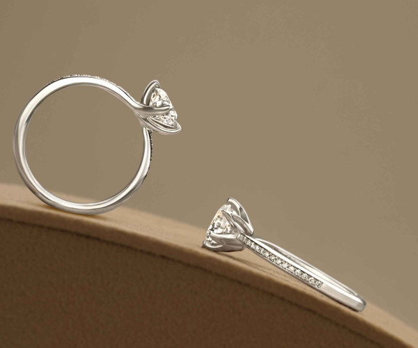 2 diamond rings laying next to each other