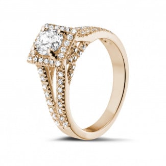 Anello solitario con diamante da 0,70 carati in oro rosso con diamanti laterali