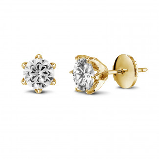 Orecchini solitari in oro giallo con diamanti rotondi da 1,00 Ct ciascuno
