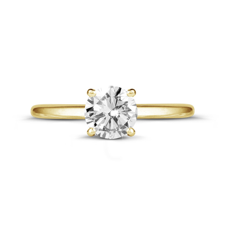 Anello solitario da 1,00 carati in oro giallo con diamante rotondo e quattro griffe