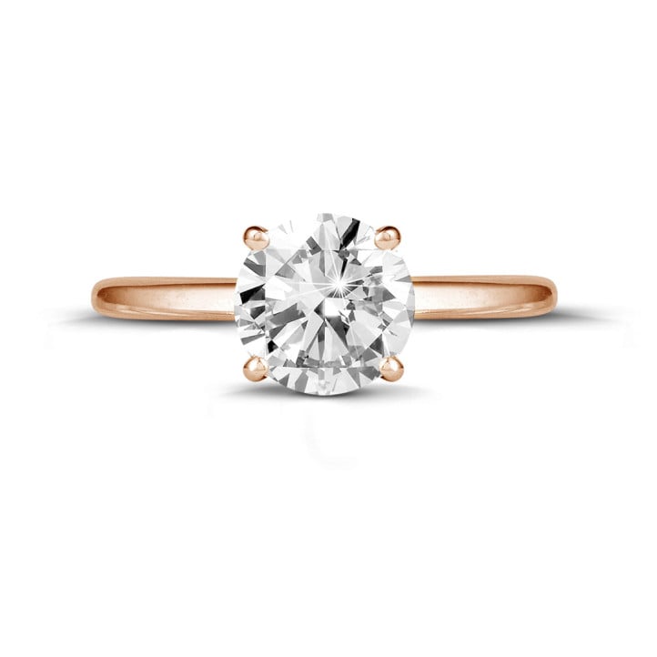 Anello solitario da 1,25 carati in oro rosso con diamante rotondo e quattro griffe