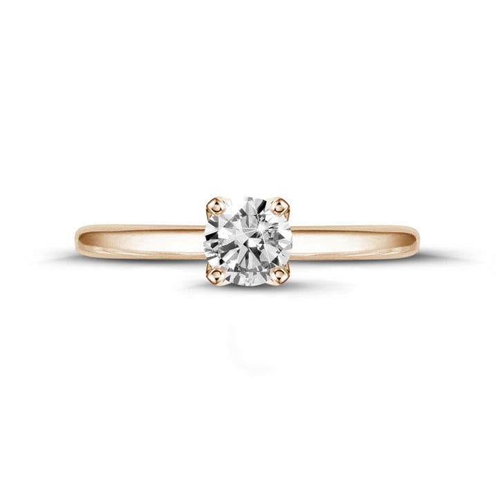 Anello solitario da 0,90 carati in oro rosso con diamante rotondo