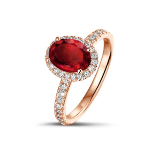 Anelli - Anello solitario Halo in oro rosso con rubino ovale e piccoli diamanti