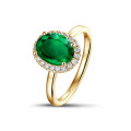 Anello Halo in oro giallo con smeraldo ovale