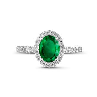 Fidanzamento - Anello solitario Halo in oro bianco con smeraldo ovale e piccoli diamanti