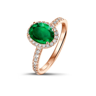 Anelli - Anello solitario Halo in oro rosso con smeraldo ovale e piccoli diamanti