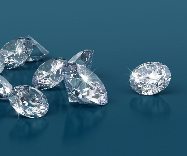 diamanti scintillanti con taglio brillante su sfondo blu