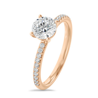 Anello solitario da 1,20 carati in oro rosso con diamanti laterali