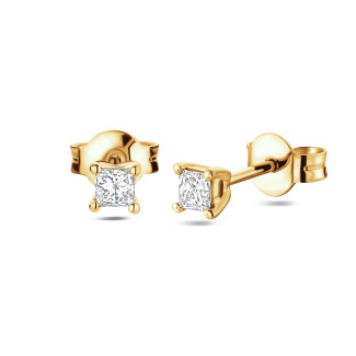 0.30ct Orecchini solitari in oro giallo con diamante taglio principessa