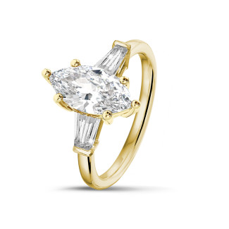 Anello trilogy da 1,00 carati in oro giallo con diamante a marquise e baguette affusolate