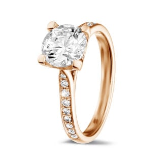 Anelli - Anello solitario con diamante da 1,50 carati in oro rosso con diamanti laterali