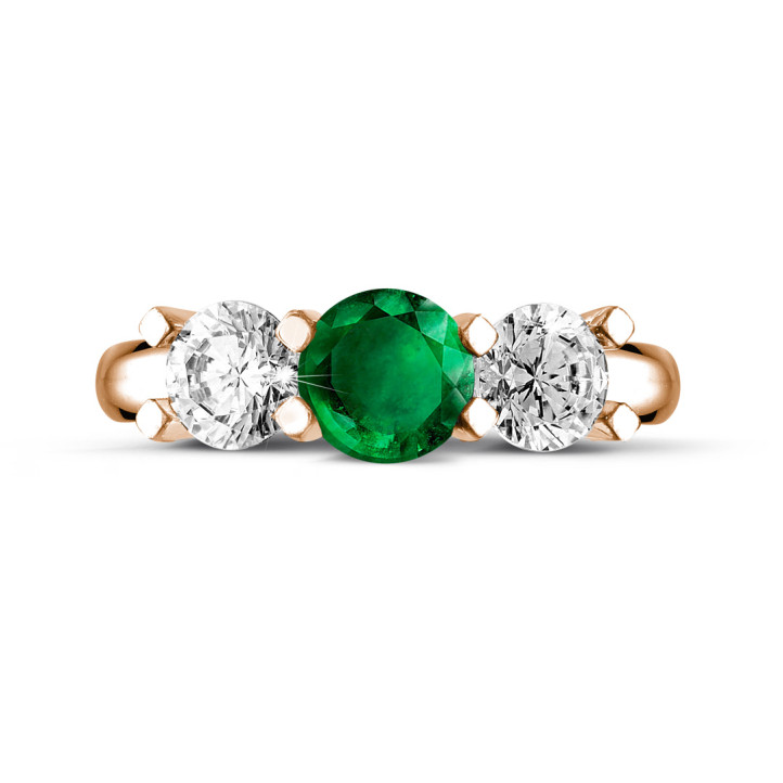 Anello trilogy in oro rosso con smeraldo centrale e 2 diamanti rotondi