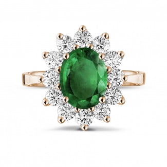 Anelli - Anello Entourage in oro rosso con smeraldo ovale e diamanti rotondi