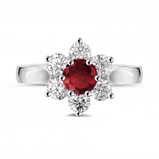 Gioielli con rubini, zaffiri e smeraldi - Anello Flowers in platino con rubino rotondo e diamanti laterali