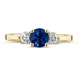 Anelli - Anello trilogy in oro giallo con zaffiro centrale e 2 diamanti rotondi