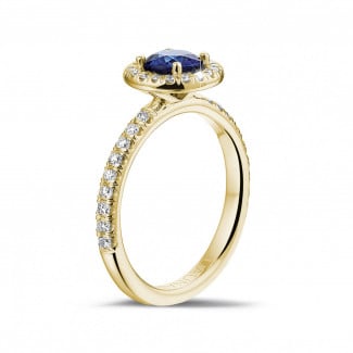 Anelli - Anello solitario Halo in oro giallo con zaffiro rotondo e piccoli diamanti