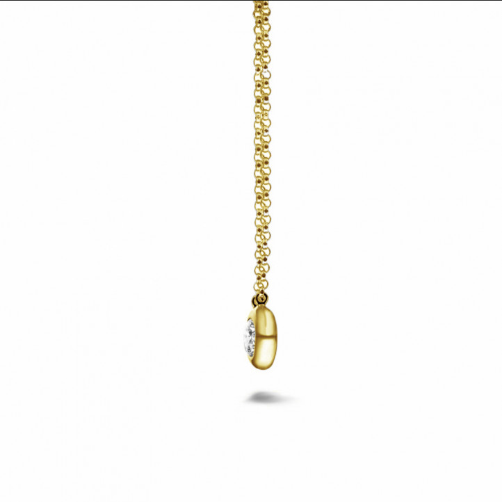 Pendente satellite con diamante da 0,30 carati in oro giallo