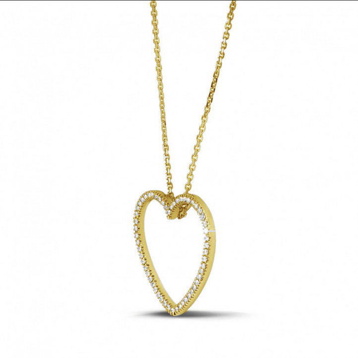 Pendente a forma di cuore con diamante da 0,75 carati in oro giallo