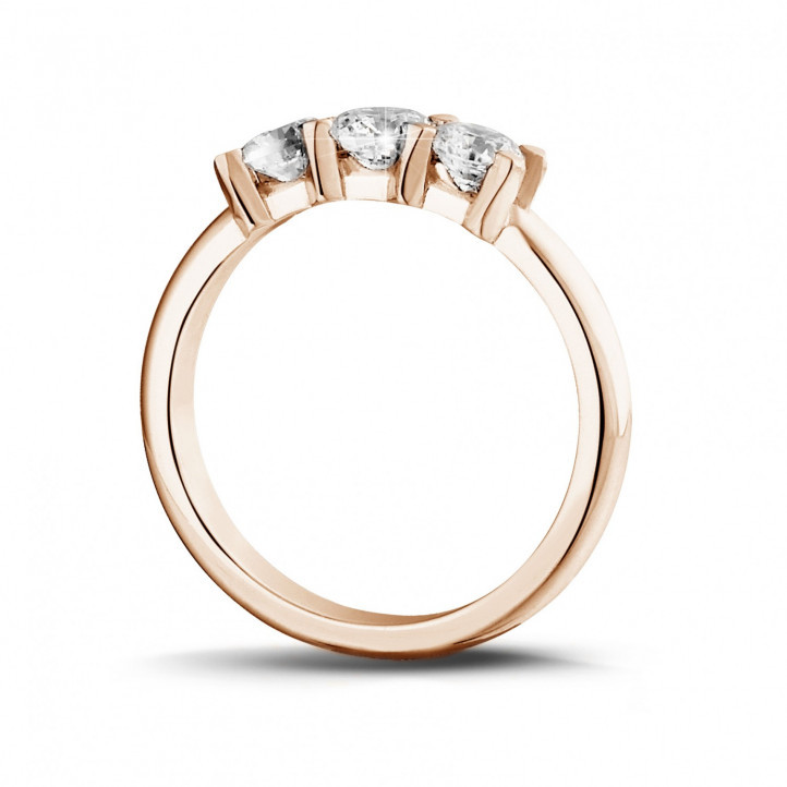 0.75 carat trilogy ring in red gold with round diamonds