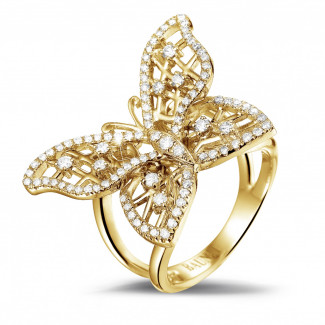 Anello con diamante da 0,75 carati con design a farfalla in oro giallo