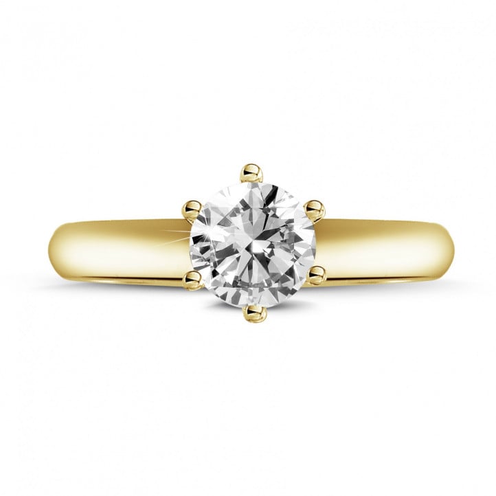 Anello solitario con diamante da 0,70 carati in oro giallo con sei griffe