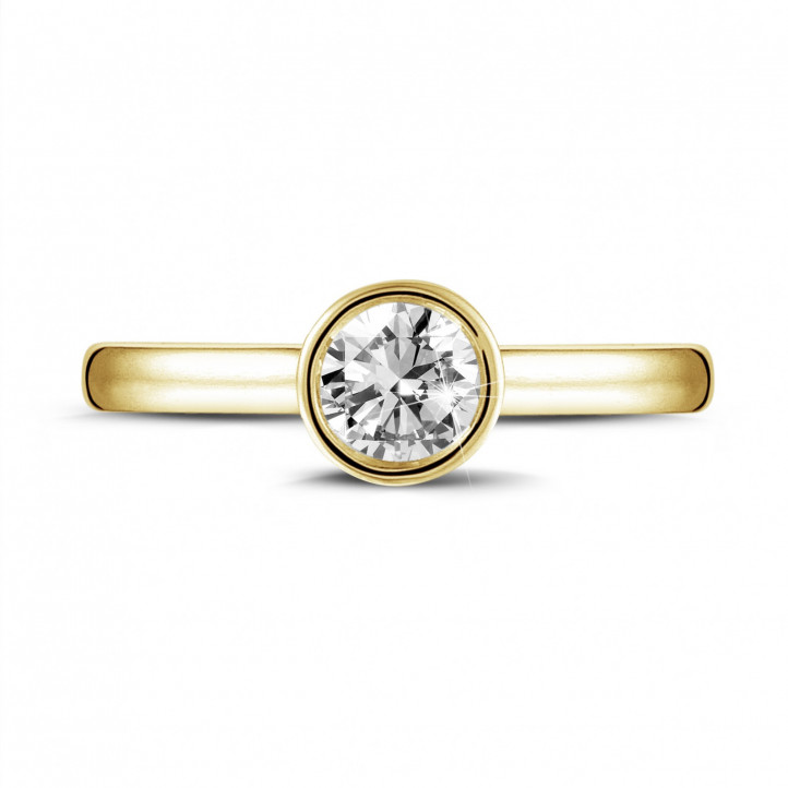 Anello solitario da 0,50 carati in oro giallo con diamante rotondo