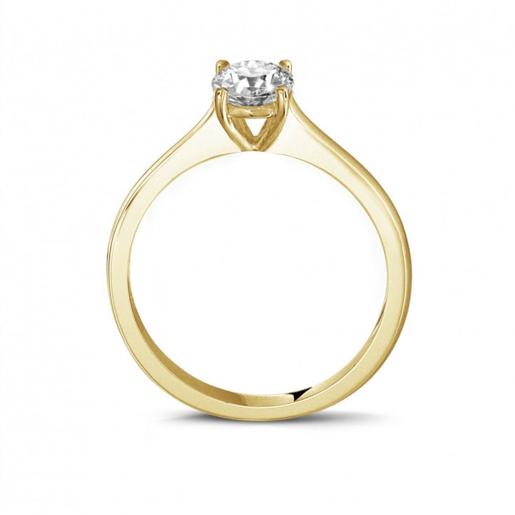 Anello solitario da 0,50 carati in oro giallo con diamante rotondo e quattro griffe
