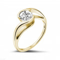 Anello con diamante solitario da 0,70 carati in oro giallo