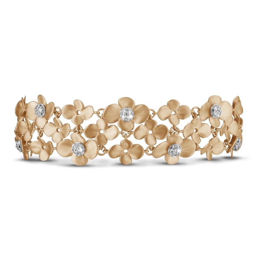 Een armband in roodgoud met bloemen design. - BAUNAT
