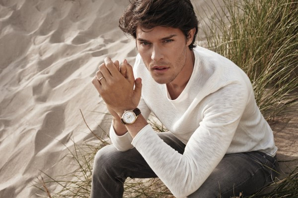 man wearing engagement ring