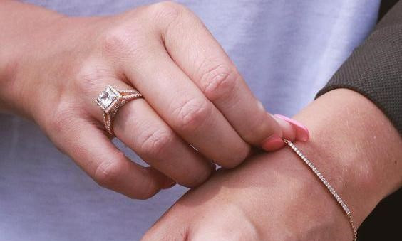 person wearing a tennis bracelet