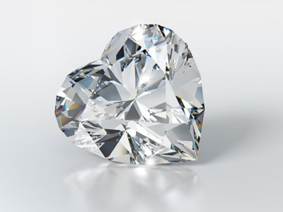 A heart-shaped diamond displayed on a pristine white background, showcasing its brilliance and unique cut