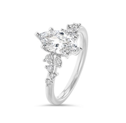 Elegant white gold diamond cluster ring featuring marquise cut white diamonds, showcasing a luxurious and sophisticated design.