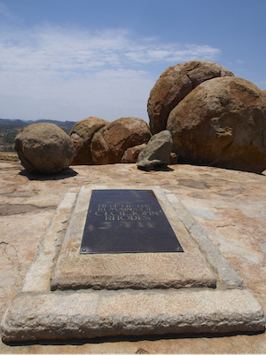 the tomb where Cecil Rhodes was laid to rest atop the Matobo Hills in Zimbabwe, carved in solid granite