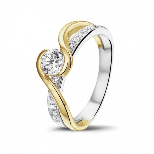 a double band ring in two-tone setting, combining both yellow gold and white gold metals into one ring