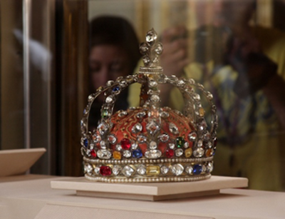 The crown of Louis XV filled with large, colourful diamonds and gemstones.