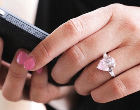 A BAUNAT pear-shaped pink diamond ring