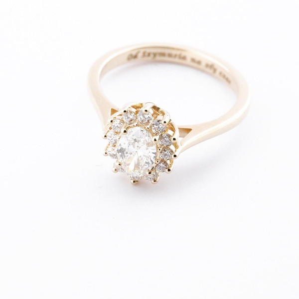an on the inside engraved engagement ring with a love quote featuring a stunning diamond