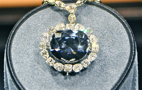 The Hope Diamond, renowned for its deep blue hue, carries a deep diamond symbolism and is famously believed to be cursed
