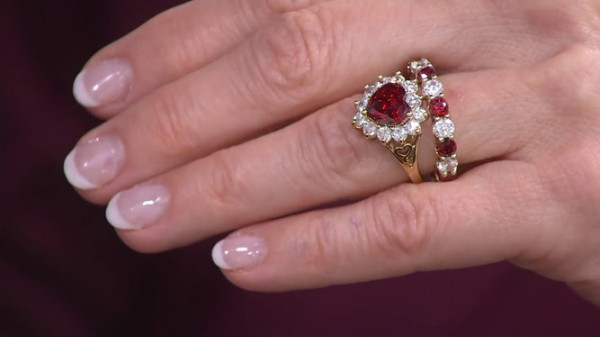 a reconstruction of both the iconic eternity and engagement ring from Grace Kelly, both elegantly adorned with red rubies