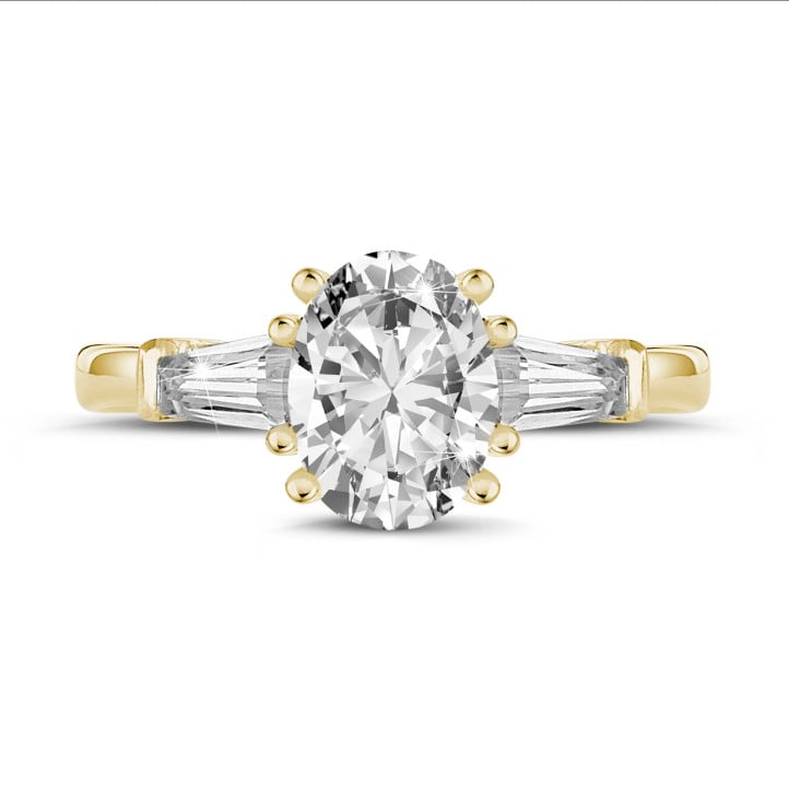 1.50 karat sarı altından oval pırlantalı ve konik bagetli üçleme yüzük